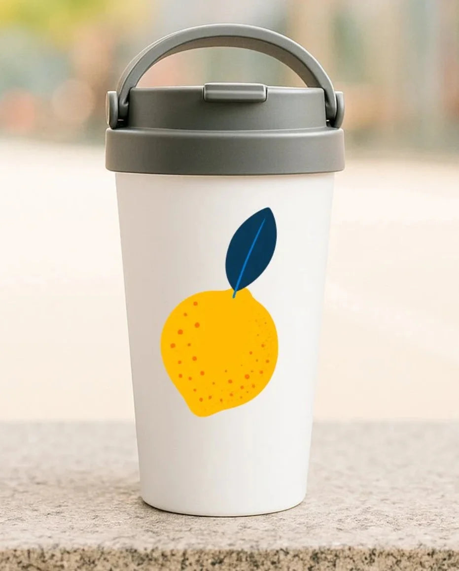 White travel mug with minimalist lemon illustration on the front
