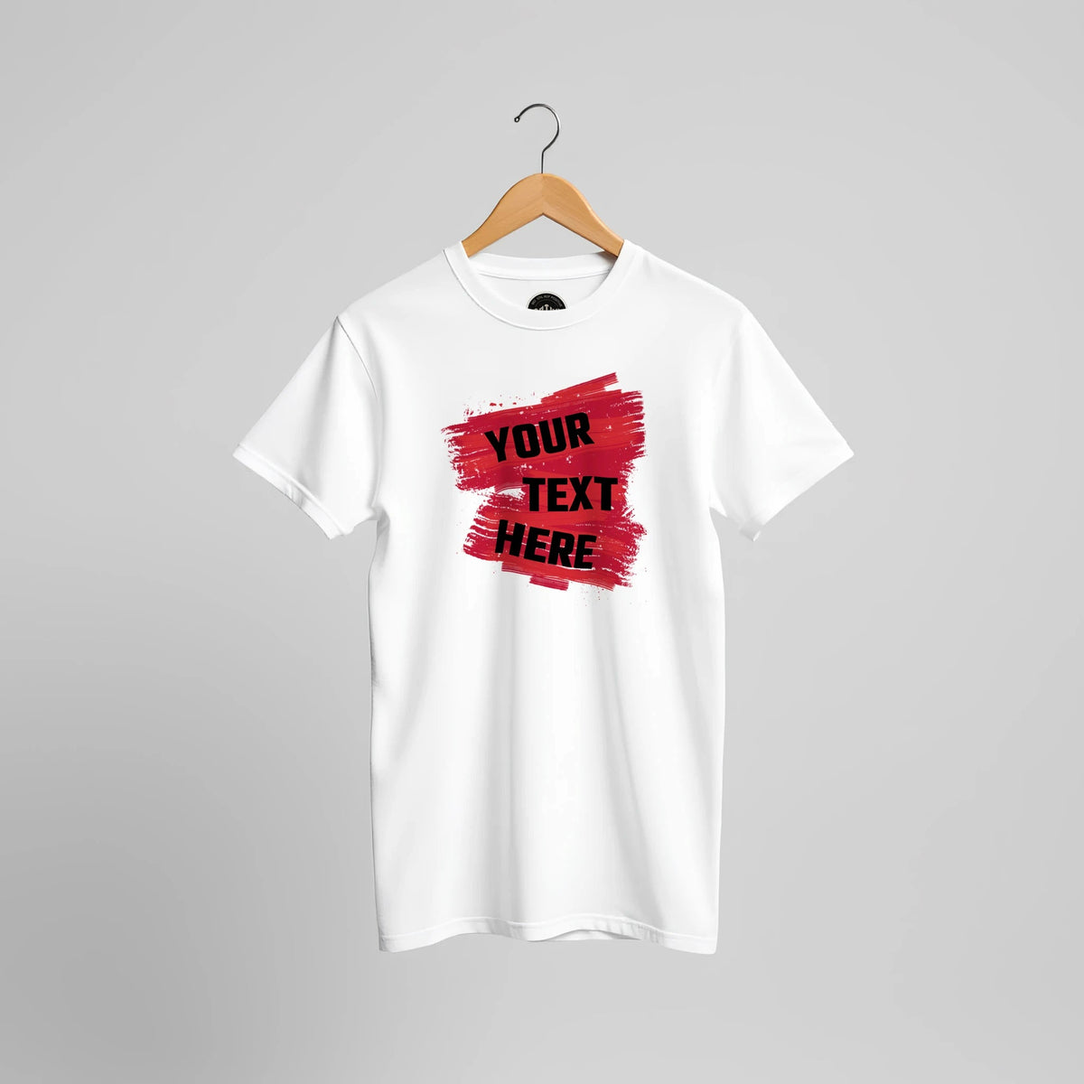 White T-shirt with a red brushstroke and sample text “YOUR TEXT HERE”, front view.